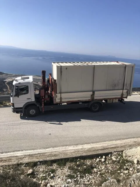 Transporte me kamion vinxh.