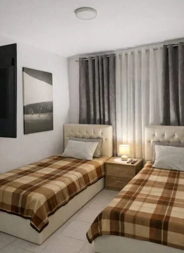 Tirane, jepet me qera apartament 2+1 Kati 1, 750 € (vasil shanto)