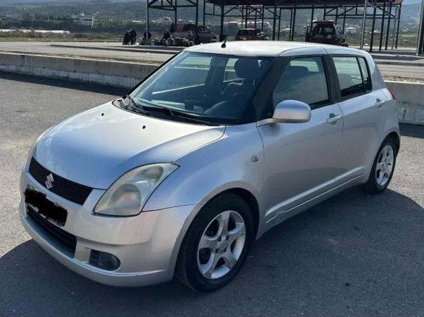 Berat, shes makine Suzuki Swift Benzin+Gaz, gri metalizato manuale Kondicioner 154.000 km 2.200 €