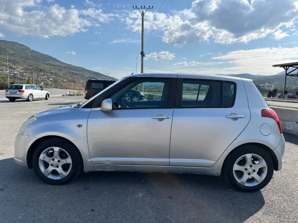 Berat, shes makine Suzuki Swift Benzin+Gaz, gri metalizato manuale Kondicioner 154.000 km 2.200 €