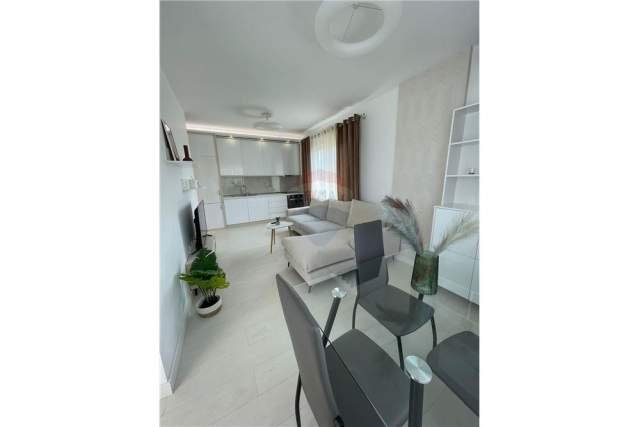 Tirane, jepet me qera apartament 1+1+BLK Kati 9, 62 m²  (KOMUNA PARISIT)