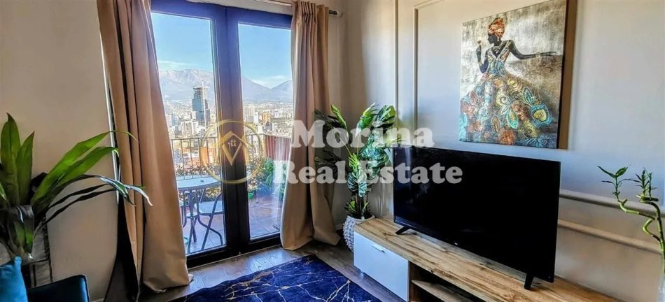 Tirane, jepet me qera apartament 1+1+Ballkon Kati 21, 75 m² 800 € (Rr.Kavajes/Tirana Garden Building)